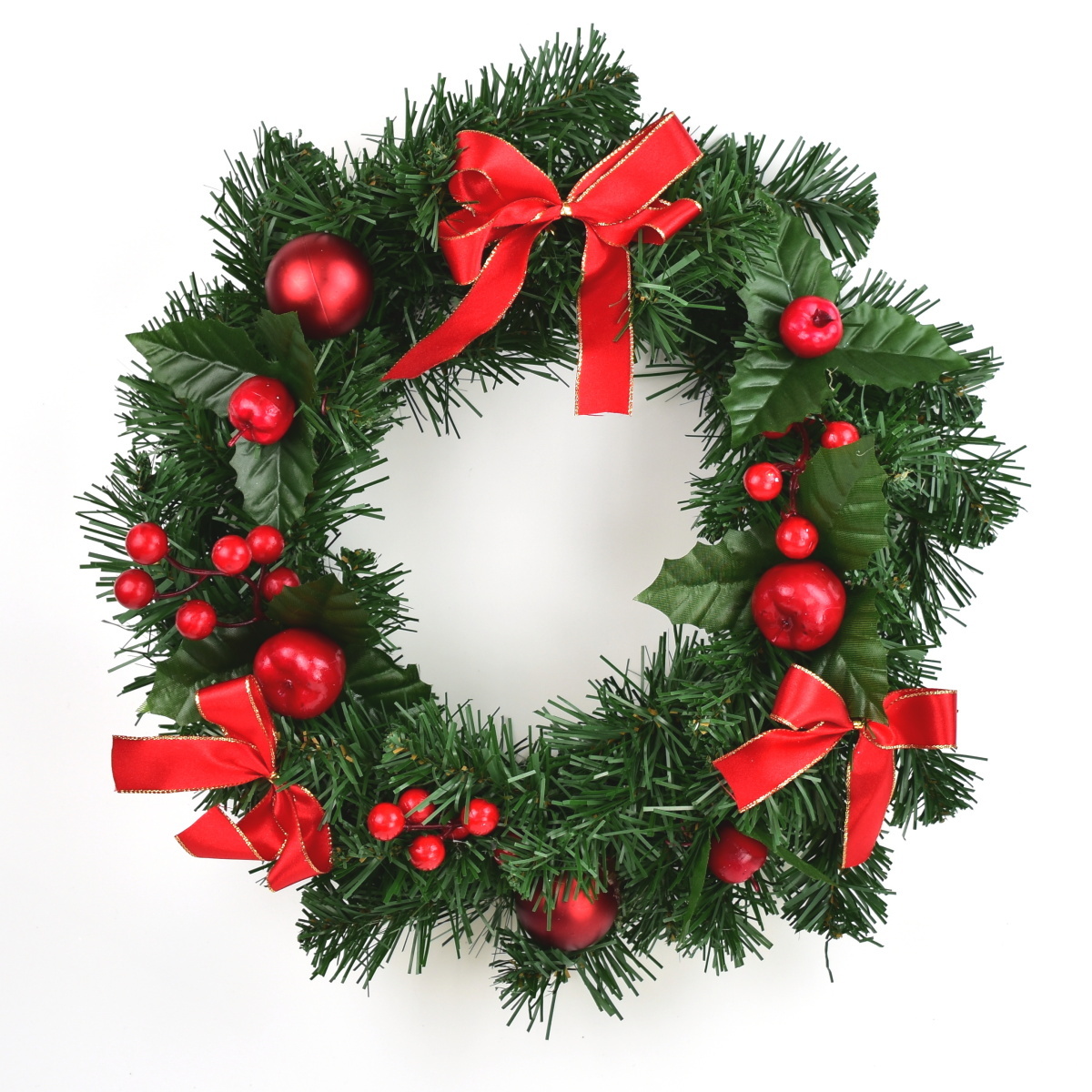 Vianočný veniec zdobený jabĺčkami a mašľami